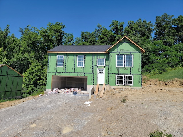 458 Eagle Creek Dr, Dry Ridge, KY 41035 - view of front of home featuring dirt driveway and an attached garage