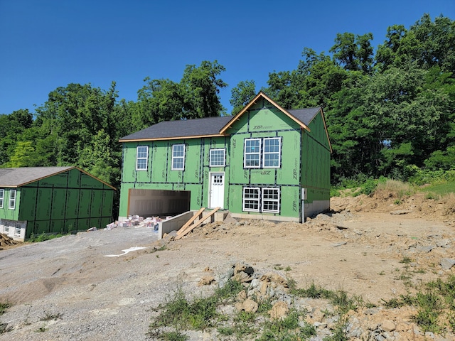 458 Eagle Creek Dr, Dry Ridge, KY 41035 - unfinished property featuring driveway and an attached garage
