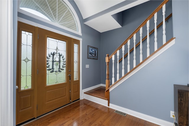 103 Mohawk Trl, Dry Ridge, KY 41035 - entryway featuring wood finished floors, stairs, healthy amount of natural light, and lofted ceiling