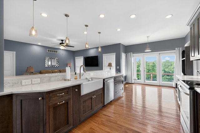 103 Mohawk Trl, Dry Ridge, KY 41035 - kitchen with stainless steel appliances, a ceiling fan, dark brown cabinetry, recessed lighting, and light wood finished floors
