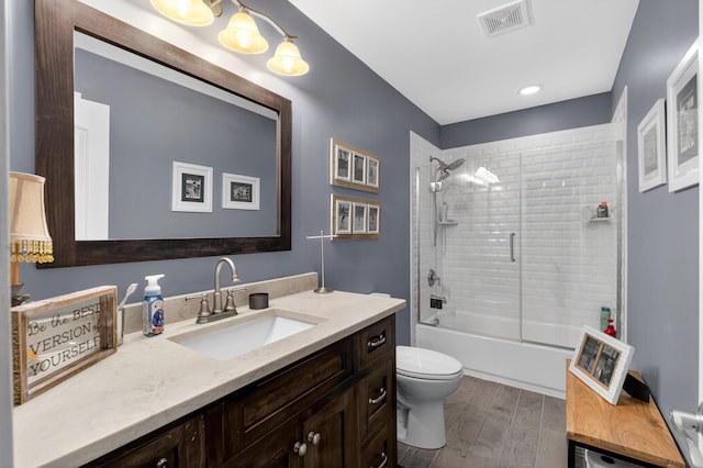 103 Mohawk Trl, Dry Ridge, KY 41035 - bathroom with vanity, combined bath / shower with glass door, and wood finished floors