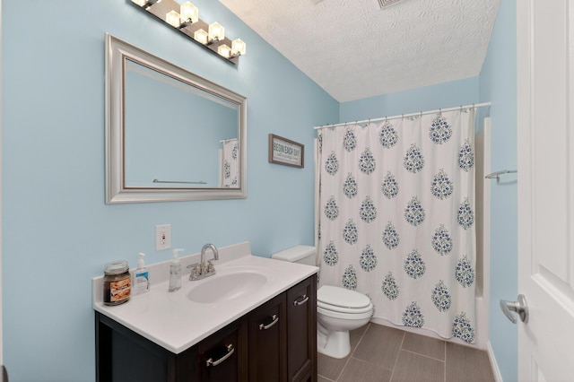 103 Mohawk Trl, Dry Ridge, KY 41035 - full bathroom with vanity, a textured ceiling, a shower with shower curtain, and tile patterned flooring