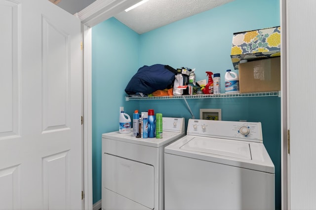 103 Mohawk Trl, Dry Ridge, KY 41035 - laundry area featuring washing machine and clothes dryer and a textured ceiling