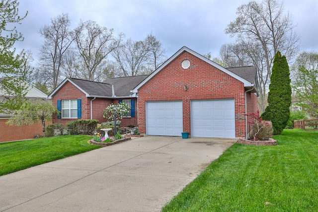 6315 Baymiller Ln, Burlington, KY 41005 - view of front of house with a garage, brick siding, driveway, and a front yard