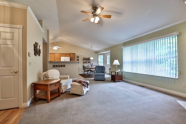 6315 Baymiller Ln, Burlington, KY 41005 - living area featuring a ceiling fan, vaulted ceiling, light carpet, and ornamental molding