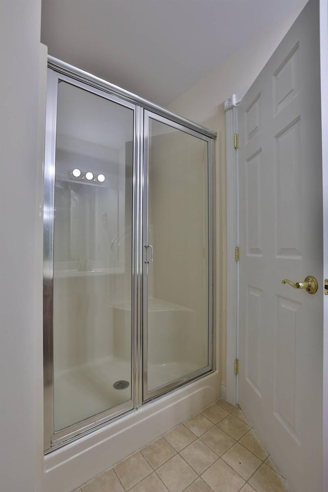 6315 Baymiller Ln, Burlington, KY 41005 - full bathroom featuring tile patterned floors and a shower stall