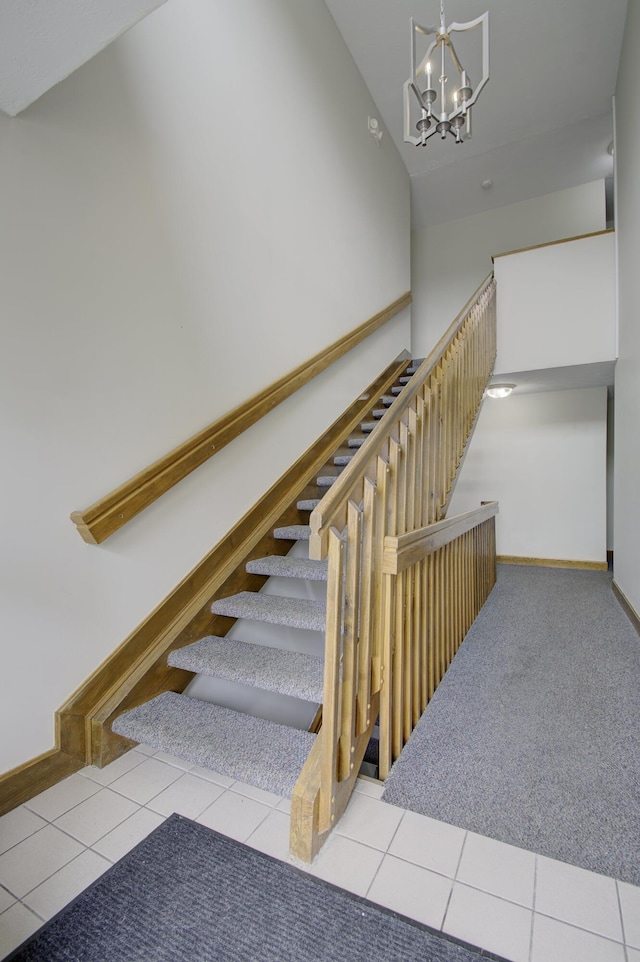7305 Centrecrest Ln Unit G, Florence, KY 41042 - stairs with a chandelier, tile patterned floors, and high vaulted ceiling