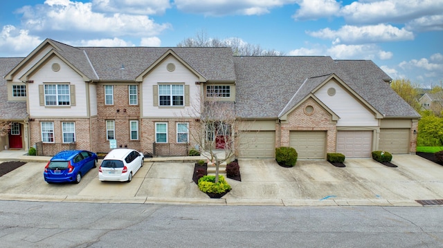 7305 Centrecrest Ln Unit G, Florence, KY 41042 - view of property with brick siding, driveway, and a shingled roof