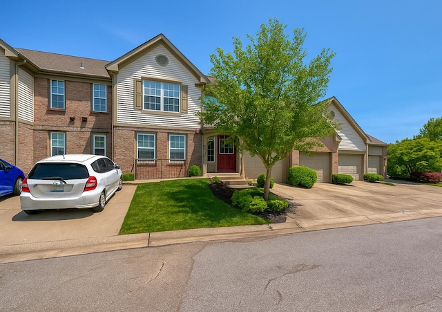 7305 Centrecrest Ln Unit G, Florence, KY 41042 - view of front facade featuring driveway and a front yard