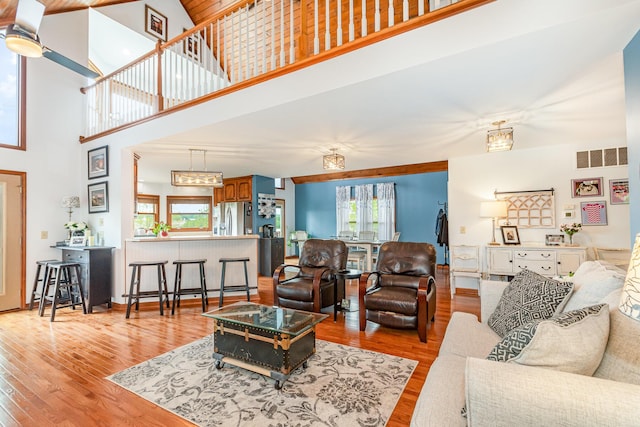 9500 Lower River Rd, Burlington, KY 41005 - living room with plenty of natural light, light wood-type flooring, and a towering ceiling