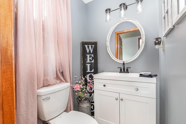 9500 Lower River Rd, Burlington, KY 41005 - bathroom featuring vanity and toilet