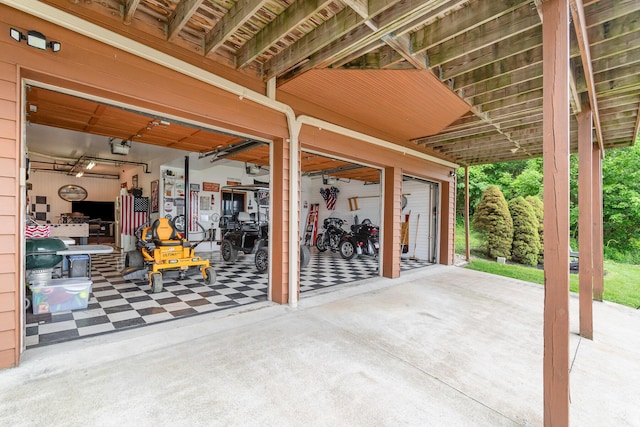 9500 Lower River Rd, Burlington, KY 41005 - garage featuring driveway and a garage door opener