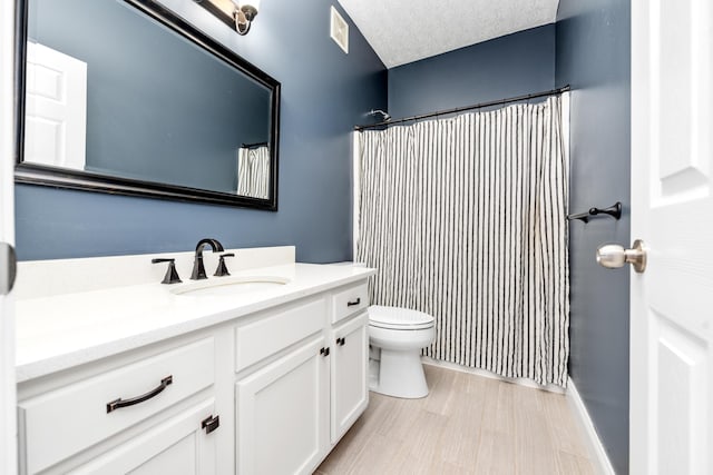 2373 Frontier Dr, Hebron, KY 41048 - bathroom with vanity, a shower with shower curtain, and a textured ceiling