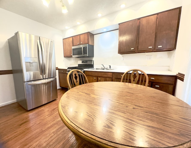 13 Drexel Ave, Florence, KY 41042 - kitchen with stainless steel appliances, wood finished floors, and light countertops