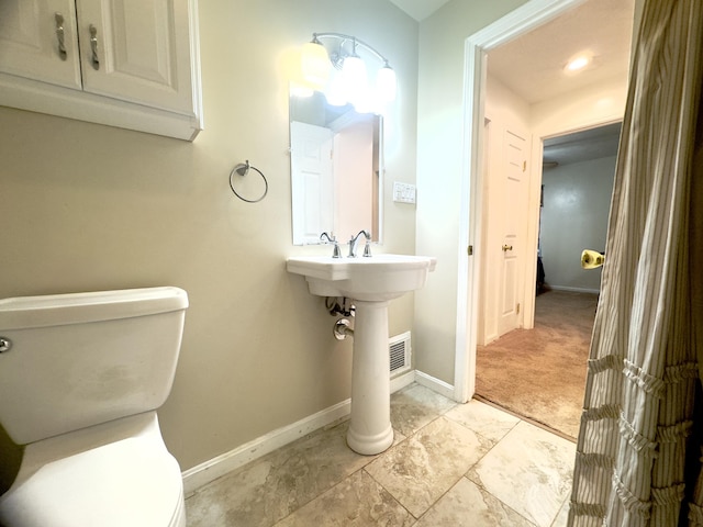 13 Drexel Ave, Florence, KY 41042 - bathroom with toilet and baseboards