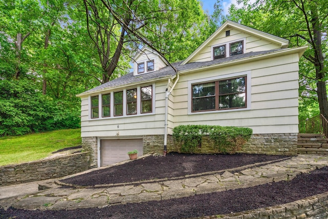 6 Hanover Pl, Fort Thomas, KY 41075 - view of front of property featuring driveway, an attached garage, and roof with shingles