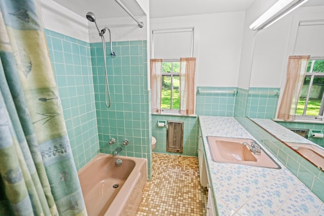 6 Hanover Pl, Fort Thomas, KY 41075 - bathroom with tile walls, tile patterned floors, vanity, shower / bath combo, and a wainscoted wall
