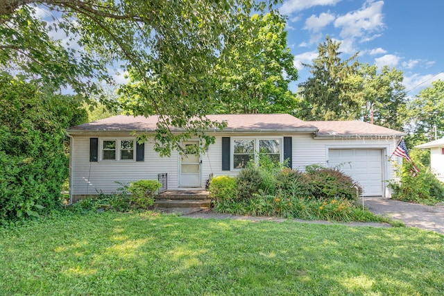 31 Bedinger Ave, Walton, KY 41094 - single story home with a garage, a front lawn, and asphalt driveway
