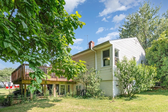 31 Bedinger Ave, Walton, KY 41094 - rear view of property with a yard, a chimney, and a deck