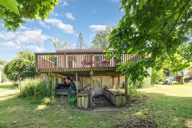 31 Bedinger Ave, Walton, KY 41094 - back of house with a wooden deck and a yard