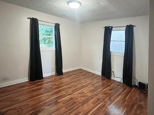 635 Willow St, Elsmere, KY 41018 - unfurnished room featuring wood finished floors and a textured ceiling