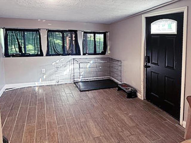 635 Willow St, Elsmere, KY 41018 - entryway featuring wood finished floors and a textured ceiling