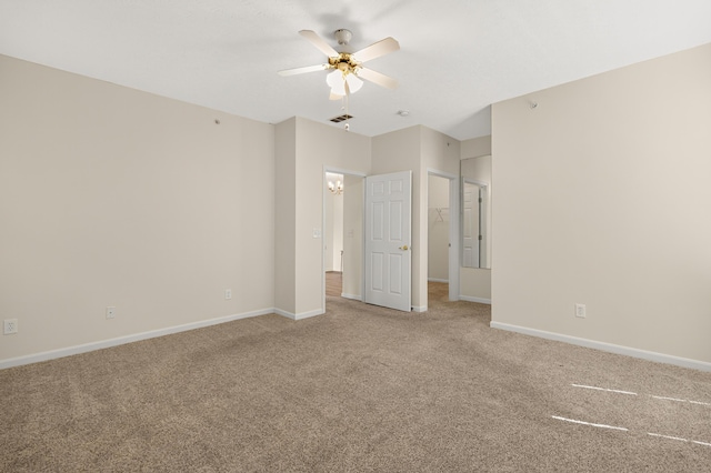 523 Ivy Ridge Dr, Cold Spring, KY 41076 - unfurnished bedroom featuring carpet floors, a spacious closet, ceiling fan, and a chandelier
