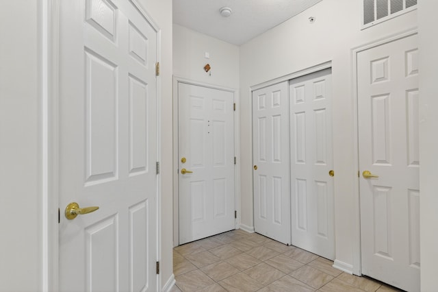 523 Ivy Ridge Dr, Cold Spring, KY 41076 - foyer with light tile patterned floors and baseboards