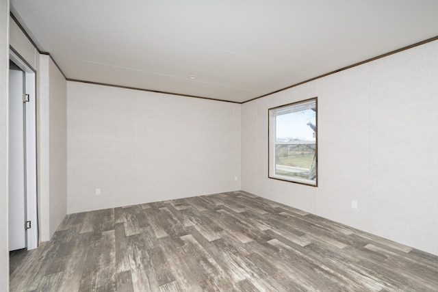 6515 Cull Rd, Owenton, KY 40359 - unfurnished bedroom featuring wood finished floors and crown molding