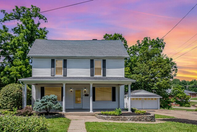 8 Gibbons St, Florence, KY 41042 - view of front of property featuring a detached garage, an outdoor structure, covered porch, and roof with shingles
