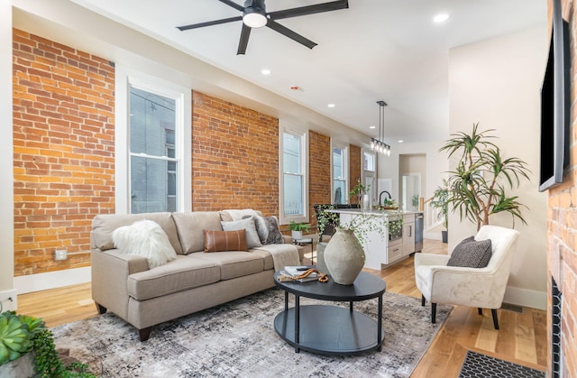 243 Latta Ave, Ludlow, KY 41016 - living area with brick wall, a ceiling fan, light wood-style flooring, and recessed lighting