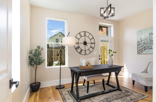 243 Latta Ave, Ludlow, KY 41016 - office with wood finished floors and a chandelier