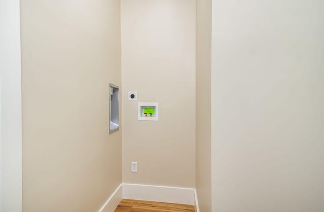 243 Latta Ave, Ludlow, KY 41016 - laundry area featuring electric dryer hookup, washer hookup, and light wood-style flooring