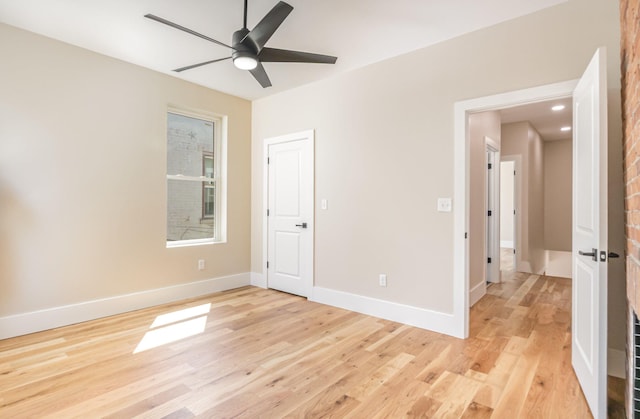 243 Latta Ave, Ludlow, KY 41016 - unfurnished bedroom with light wood-type flooring and a ceiling fan