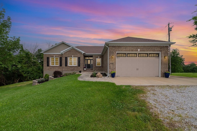 15344 Carlisle Rd, Crittenden, KY 41030 - single story home with concrete driveway, brick siding, a front yard, and a garage