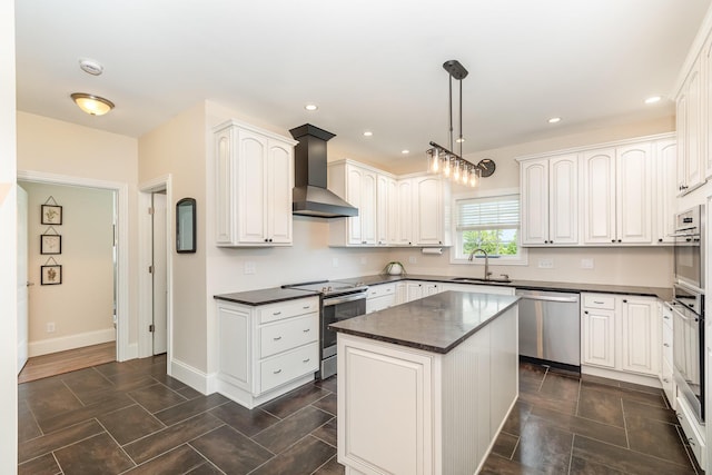15344 Carlisle Rd, Crittenden, KY 41030 - kitchen with stainless steel appliances, wall chimney exhaust hood, a center island, decorative light fixtures, and white cabinets