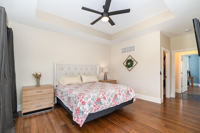 15344 Carlisle Rd, Crittenden, KY 41030 - bedroom with a raised ceiling, wood finished floors, and ceiling fan
