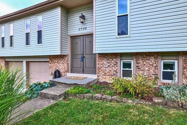 2709 Wesley Dr, Villa Hills, KY 41017 - entrance to property with brick siding and an attached garage