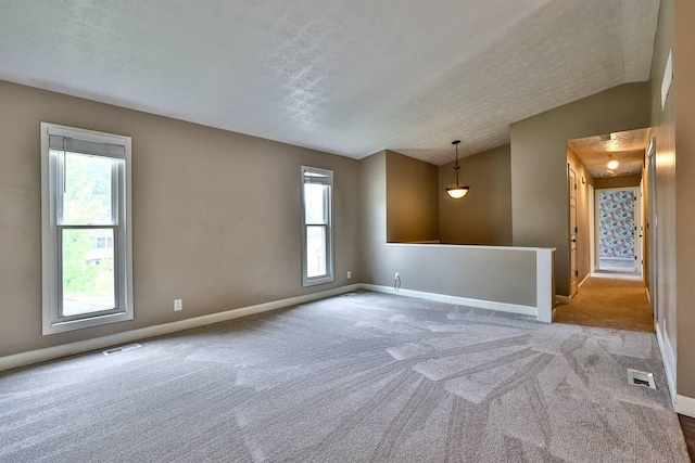 2709 Wesley Dr, Villa Hills, KY 41017 - carpeted empty room with a textured ceiling and lofted ceiling