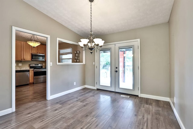 2709 Wesley Dr, Villa Hills, KY 41017 - unfurnished dining area with dark wood-style flooring, french doors, and a chandelier
