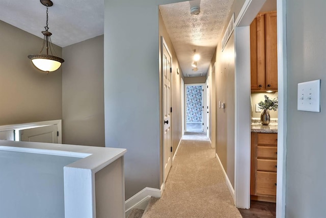 2709 Wesley Dr, Villa Hills, KY 41017 - hallway featuring light carpet and a textured ceiling