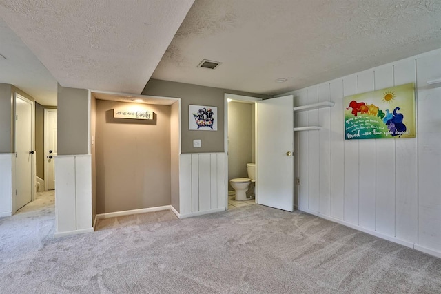 2709 Wesley Dr, Villa Hills, KY 41017 - below grade area with carpet floors and a textured ceiling