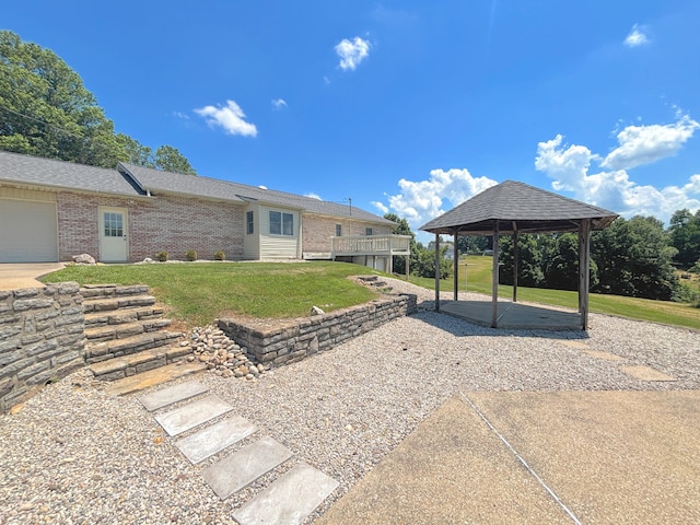 3445 Crittenden Mount Zion Rd, Dry Ridge, KY 41035 - view of grassy yard featuring a gazebo, a deck, and a patio area