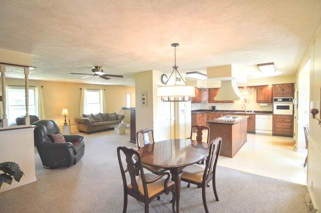 3445 Crittenden Mount Zion Rd, Dry Ridge, KY 41035 - dining space with light carpet, a textured ceiling, and a ceiling fan