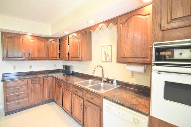 3445 Crittenden Mount Zion Rd, Dry Ridge, KY 41035 - kitchen with white appliances, dark countertops, brown cabinets, recessed lighting, and light tile patterned floors