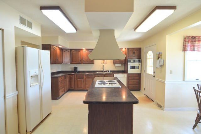3445 Crittenden Mount Zion Rd, Dry Ridge, KY 41035 - kitchen featuring white appliances, dark countertops, a center island, and island range hood