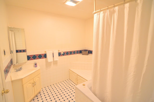 3445 Crittenden Mount Zion Rd, Dry Ridge, KY 41035 - full bathroom featuring vanity, wainscoting, tile walls, and shower / bath combo
