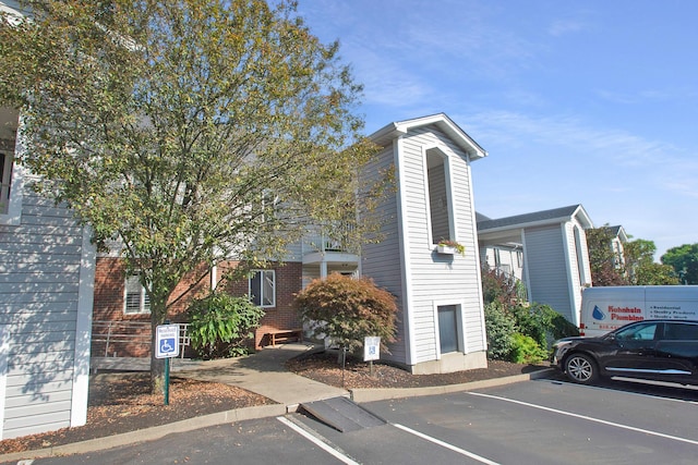 22 Carriage House Dr, Fort Thomas, KY 41075 - view of building exterior featuring uncovered parking