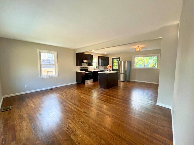 37 Fairfield Pl, Fort Thomas, KY 41075 - unfurnished living room featuring baseboards and dark wood-style flooring