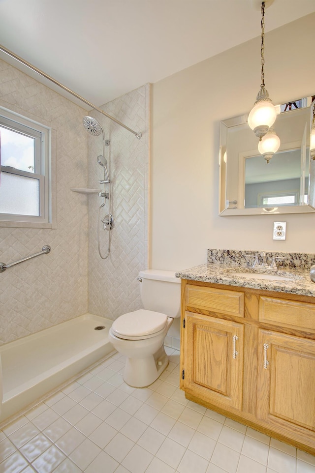 140 Williamsburg Dr, Fort Mitchell, KY 41017 - full bath featuring tile patterned flooring, vanity, and tiled shower